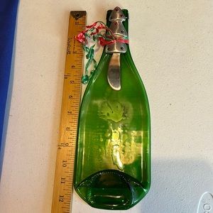 Melted wine bottle trivet/cheese board